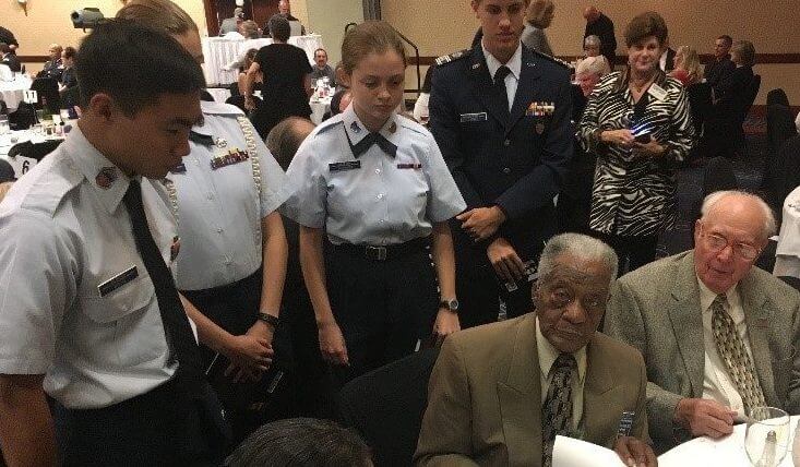James Shipley, a Tuskegee Airman, autograph his biography for young teenage cadets at the 2017 Missouri ESGR Awards Dinner. James Shipley, a Tuskegee Airman, autograph his biography for young teenage cadets at the 2017 Missouri ESGR Awards Dinner.