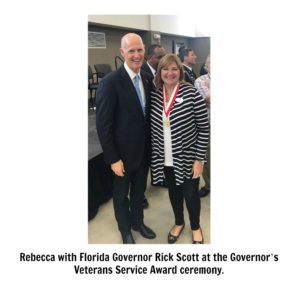 Rebecca with Florida Governor Rick Scott at the Governor’s Veterans Service Award ceremony