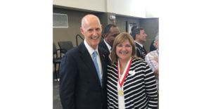 Rebecca with Florida Governor Rick Scott at the Governor’s Veterans Service Award ceremony