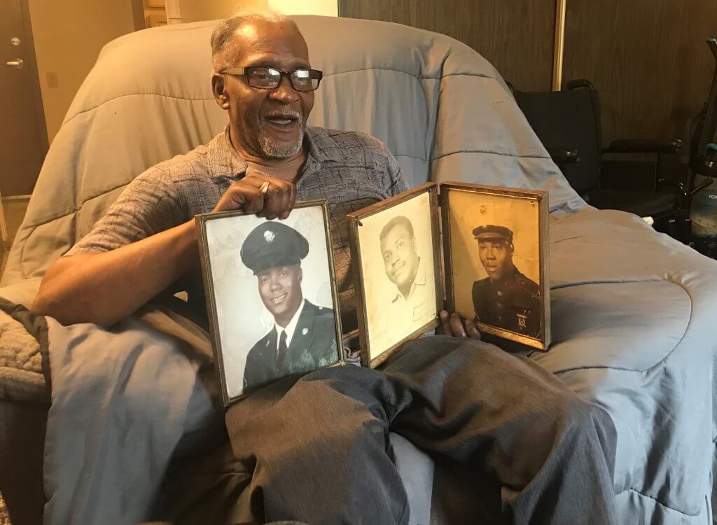 Roger-Ross---Vietnam-Veteran-with-photos-of-himself-and-his-brothers-7